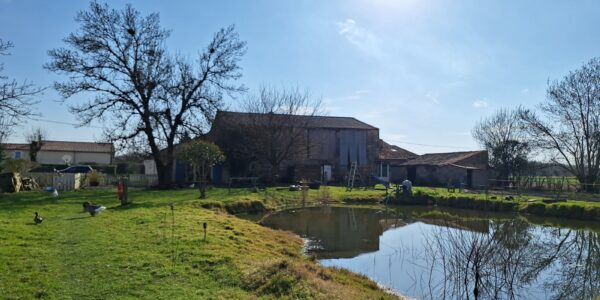 Maison au cœur d’un authentique corps de ferme